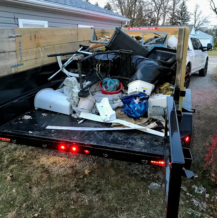 Roll-off dumpster delivered to a residential driveway in Indianola